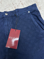 Blue monogram shorts with Gucci tag and drawstring waist