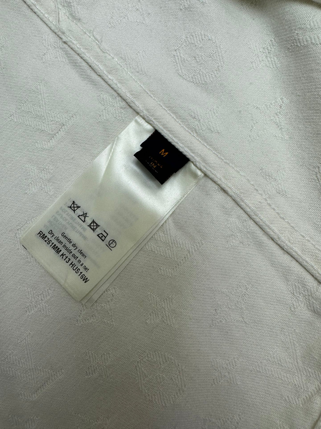 White shirt interior neck label and care tag with printed symbols