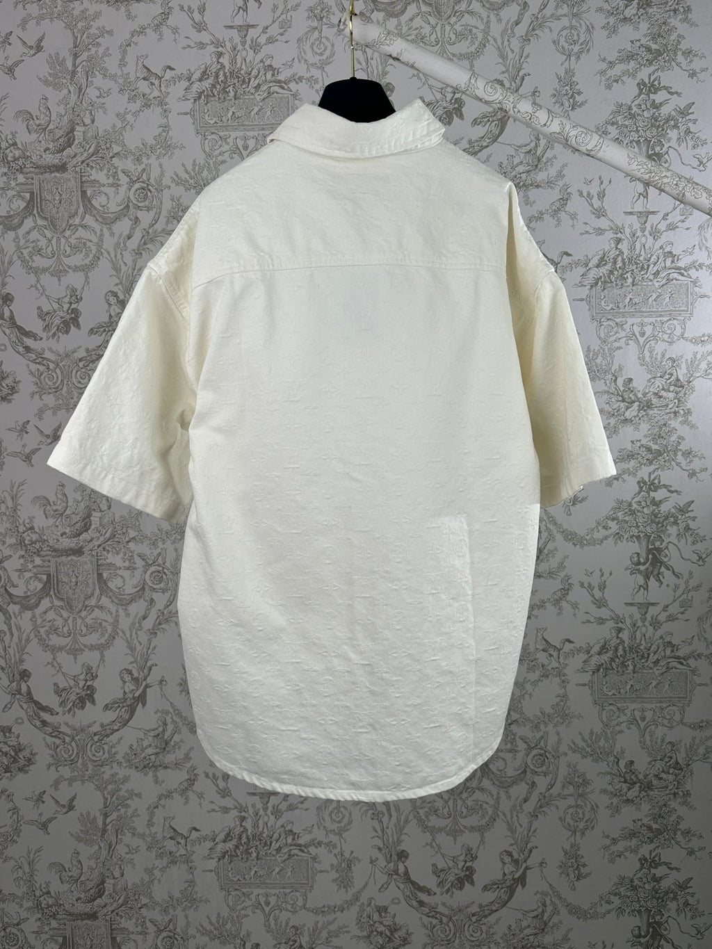 White short-sleeve button-up shirt with crew-neck back yoke