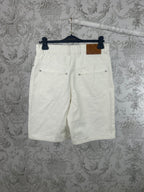 White shorts with belt loops and buttoned front pockets
