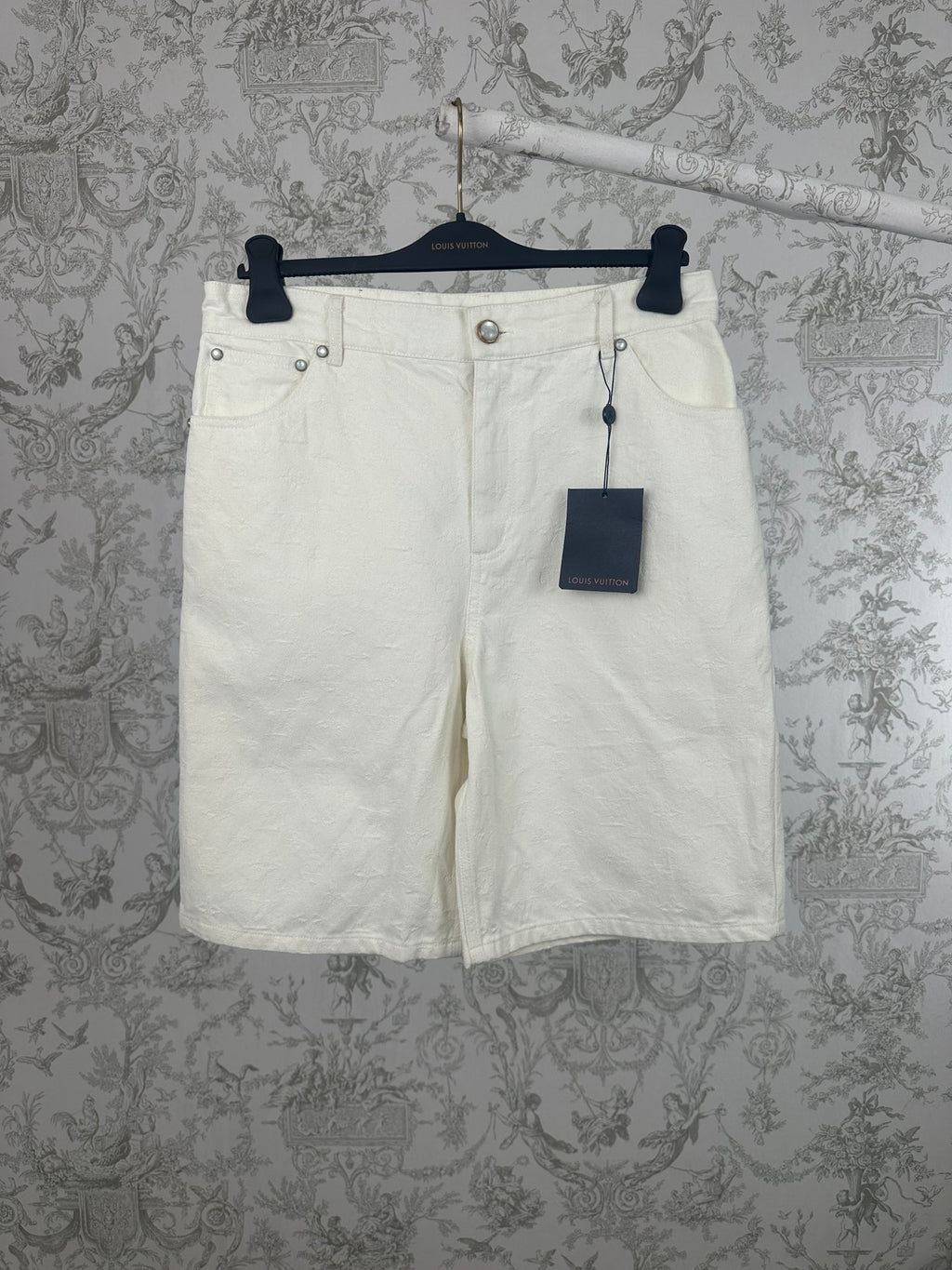 White shorts with button waist and front pockets