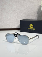Versace sunglasses with black frame and blue mirrored lenses, square shape