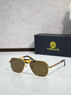 Versace sunglasses with gold-brown frame and dark lenses, square aviator style