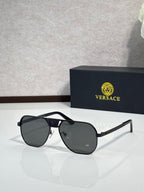 Versace sunglasses with black frame and dark lenses, square shield silhouette