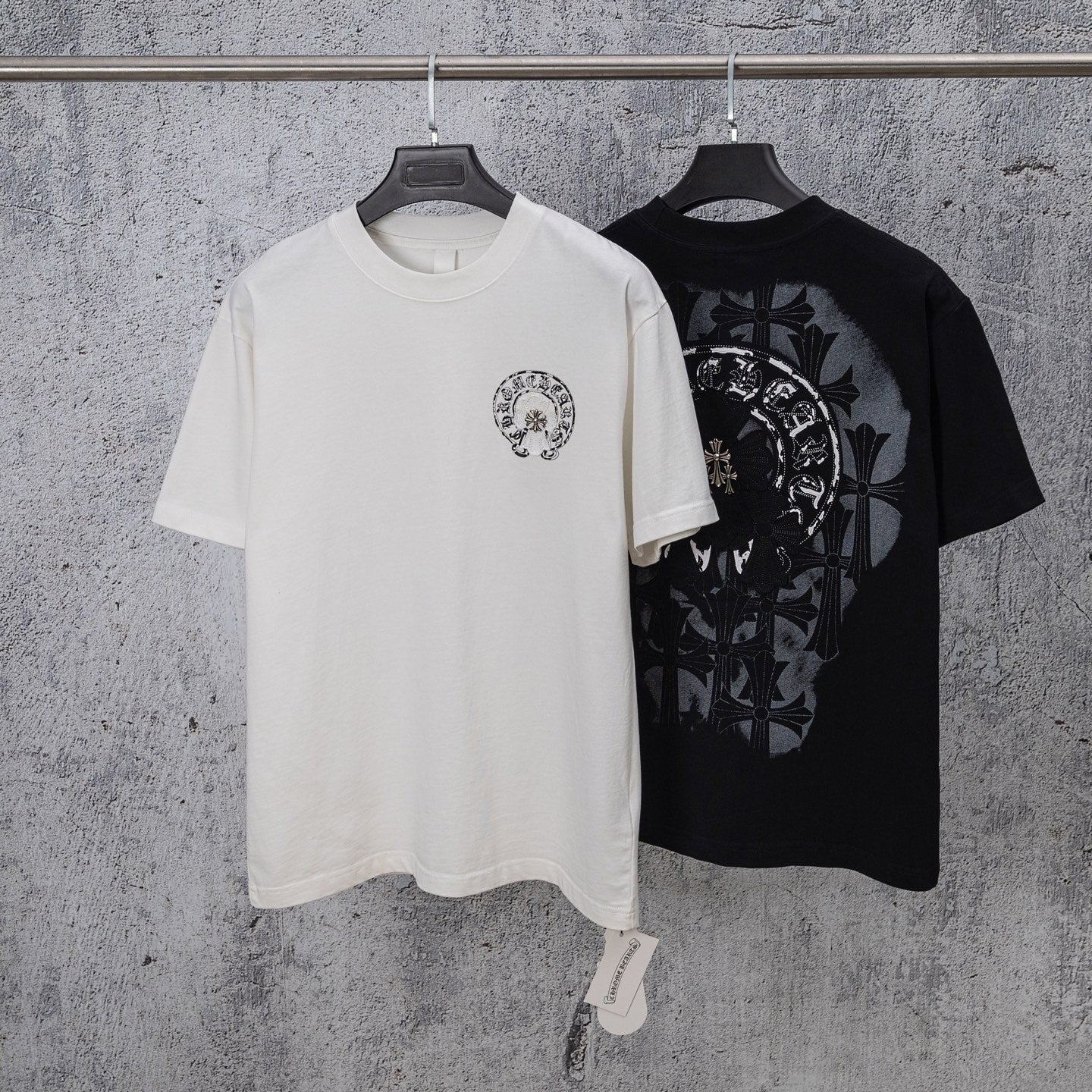 White chrome short T-shirt with small circular crest graphic on left chest