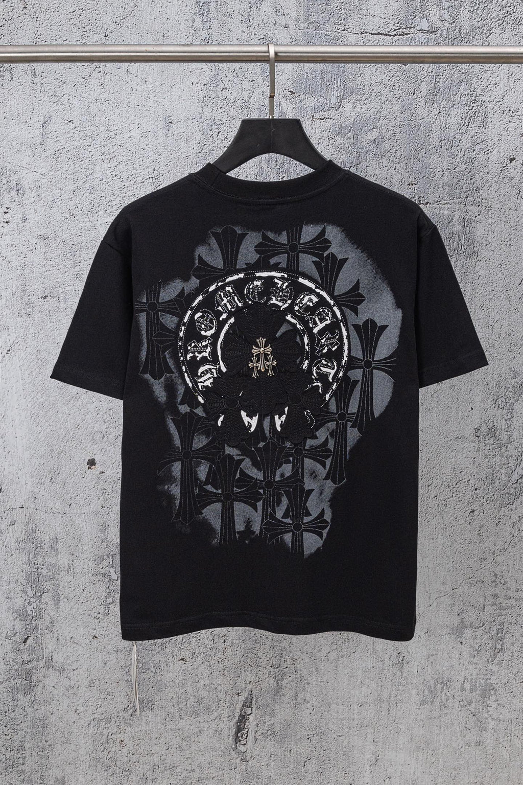Black chrome short T-shirt with large circular front graphic and ornamental leaves