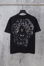 Black chrome short T-shirt with large circular front graphic and ornamental leaves