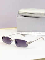 Balenciaga sunglasses, purple-tinted lenses and gold-tone metal frame