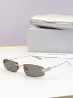 Balenciaga sunglasses, light tan lenses and gold-tone metal frame