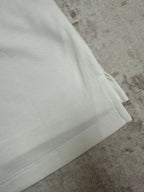 White polo sleeve cuff and side seam