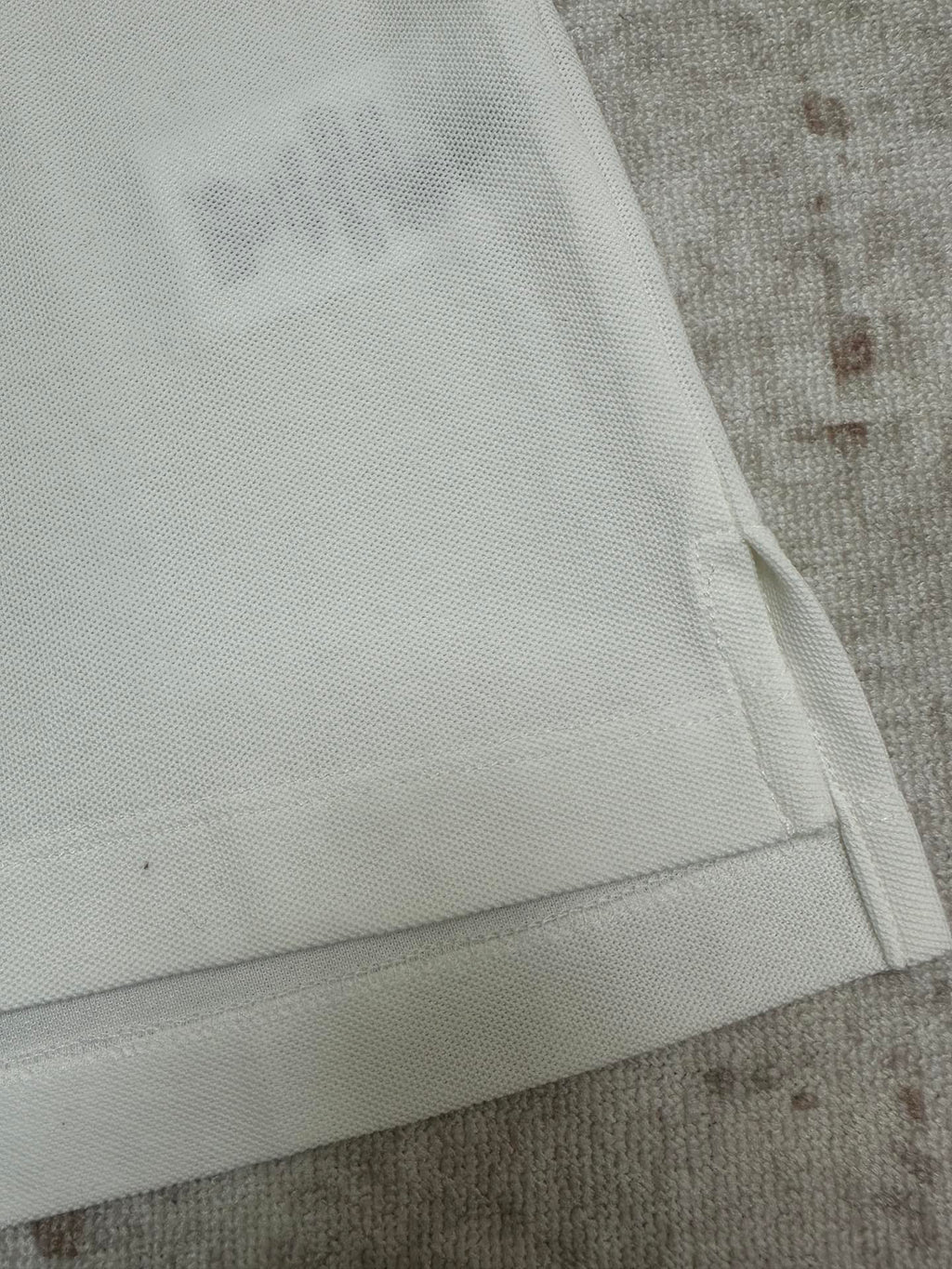 White polo sleeve hem with soft ribbed cuff