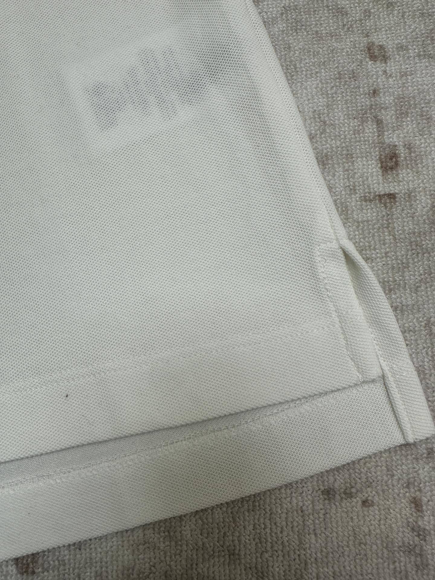 White polo sleeve hem with soft ribbed cuff