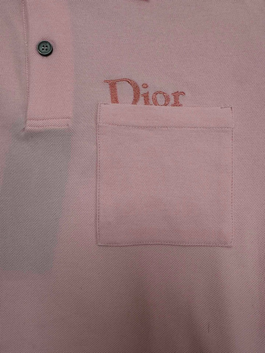 Pink Dior polo shirt logo patch on chest area, with button detail