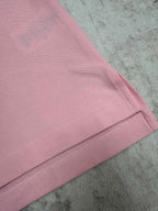Pink Dior polo shirt sleeve and cuff edge close-up