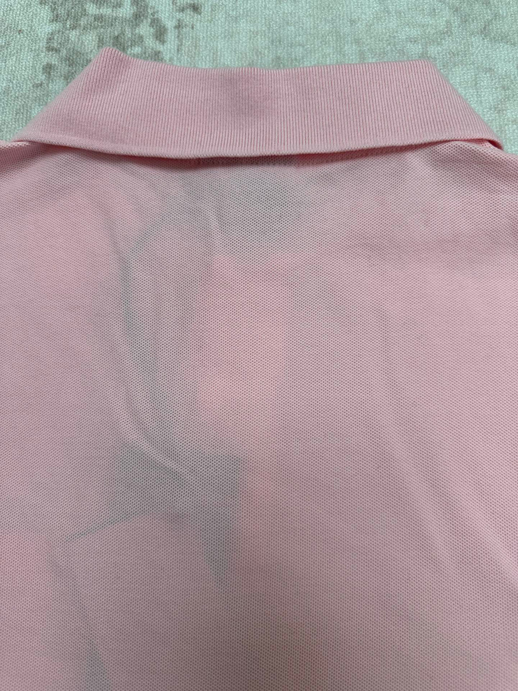 Pink Dior polo shirt back with ribbed collar hem close-up