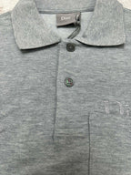 Heather gray polo shirt with button placket and embroidered chest logo