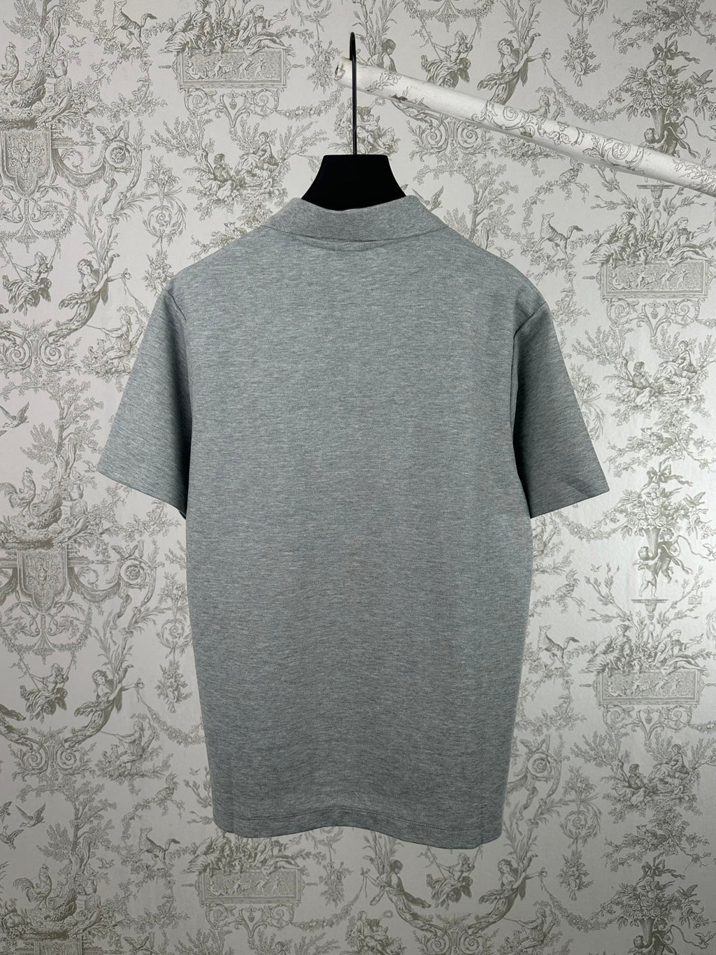 Heather gray short-sleeve polo shirt with mock collar, back view