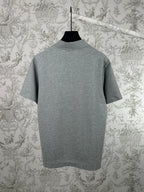Heather gray short-sleeve polo shirt with mock collar, back view