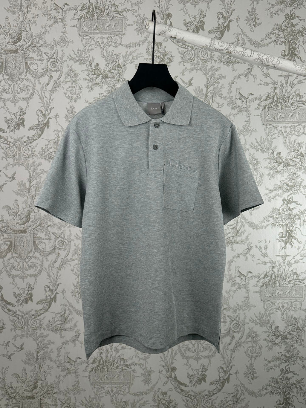 Heather gray short-sleeve polo shirt with button placket and spread collar