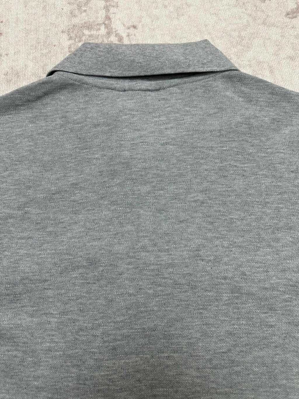 Heather gray short-sleeve polo shirt back with mock collar