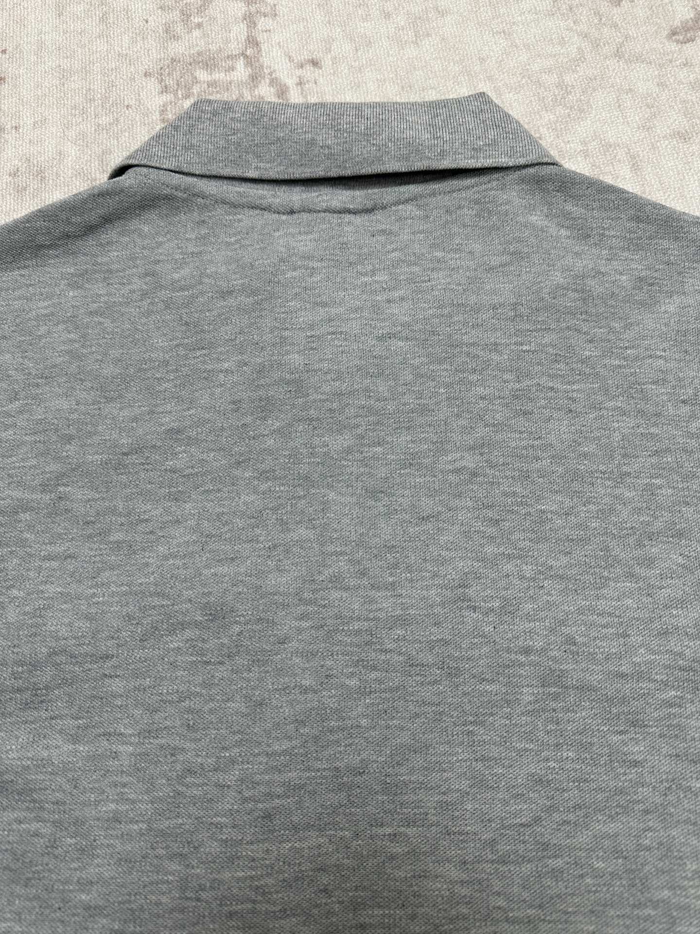 Heather gray short-sleeve polo shirt back with mock collar
