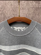 Gray knit sweater crew neck with Christian Dior label and light blue stripes