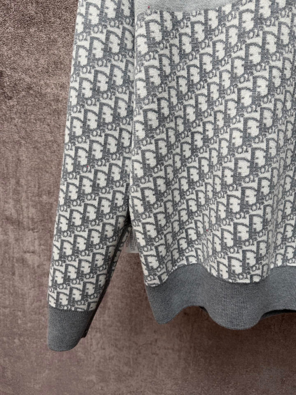 Dior long pants with gray cuffs and allover Dior-style monogram print