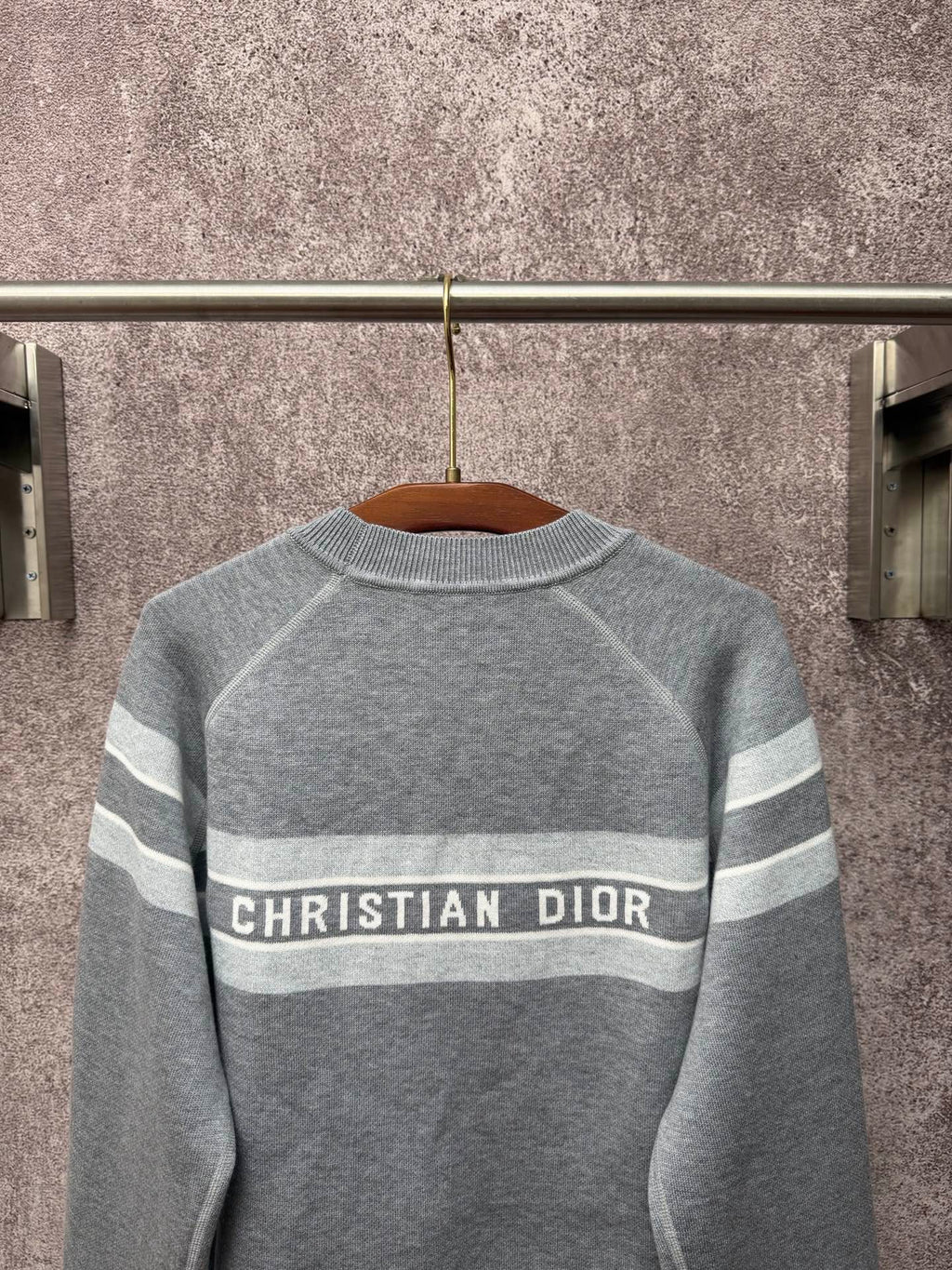 Gray long-sleeve knit sweater with Christian Dior logo band and horizontal stripes