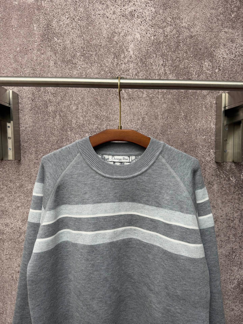 Long-sleeve knit sweater in gray with light blue and white horizontal stripes