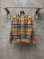 Beige plaid zip-up hoodie with attached hood, gold zipper, black and red stripes pattern