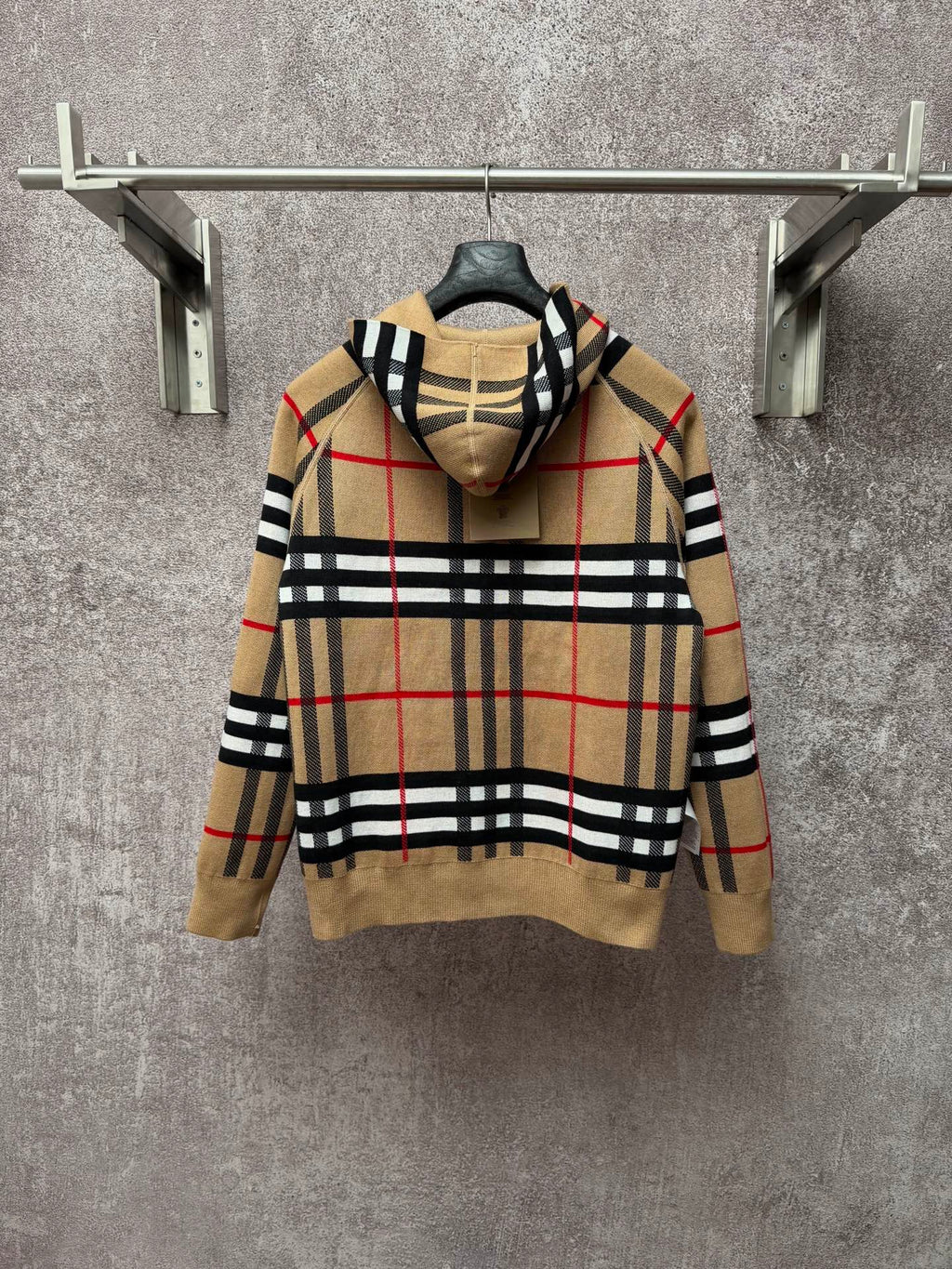 Beige plaid zip-up hoodie, attached hood, gold zipper, black and red stripe pattern