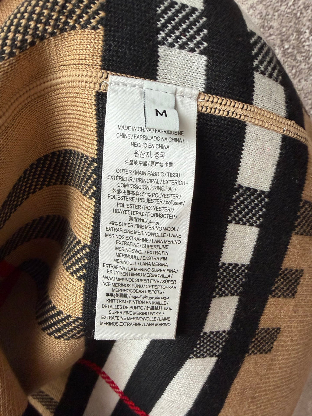 Burberry check polo shirt with care label, beige and black pattern