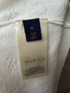 Cream care label with MADE IN ITALY and washing instructions