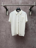 Cream short-sleeve button-up polo shirt with point collar and chest pocket