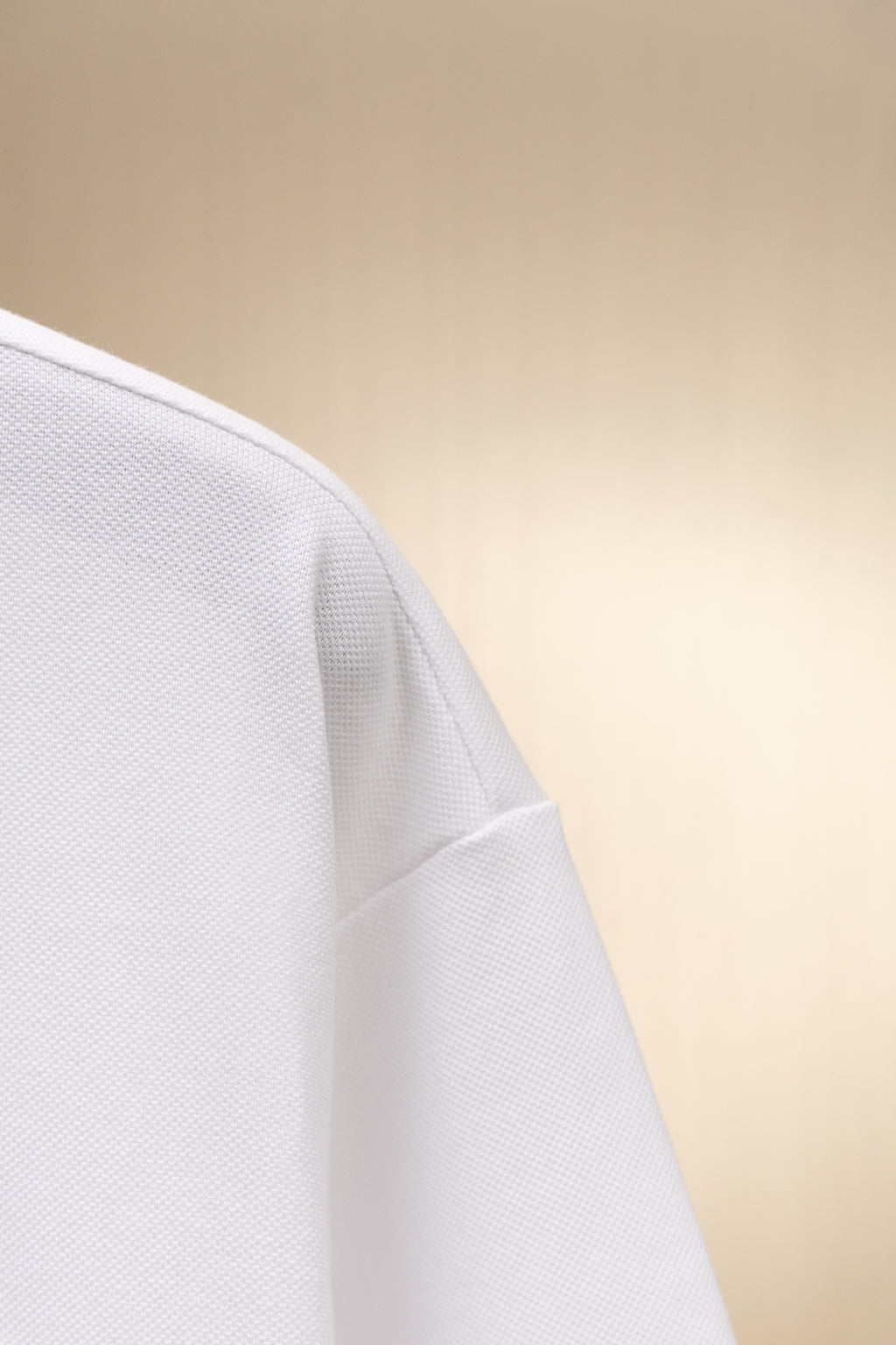 White short-sleeve shirt with curved side seam
