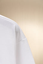 White short-sleeve shirt with curved side seam