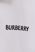 White Burberry polo shirt with BURBERRY logo on chest