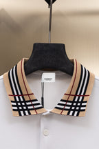 White Burberry polo shirt with check-collar trim and white button placket