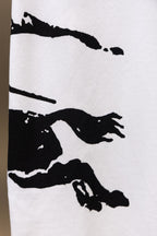 White Burberry polo shirt with black action graphic print