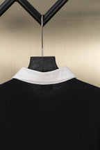 Black polo shirt collar detail in reverse view