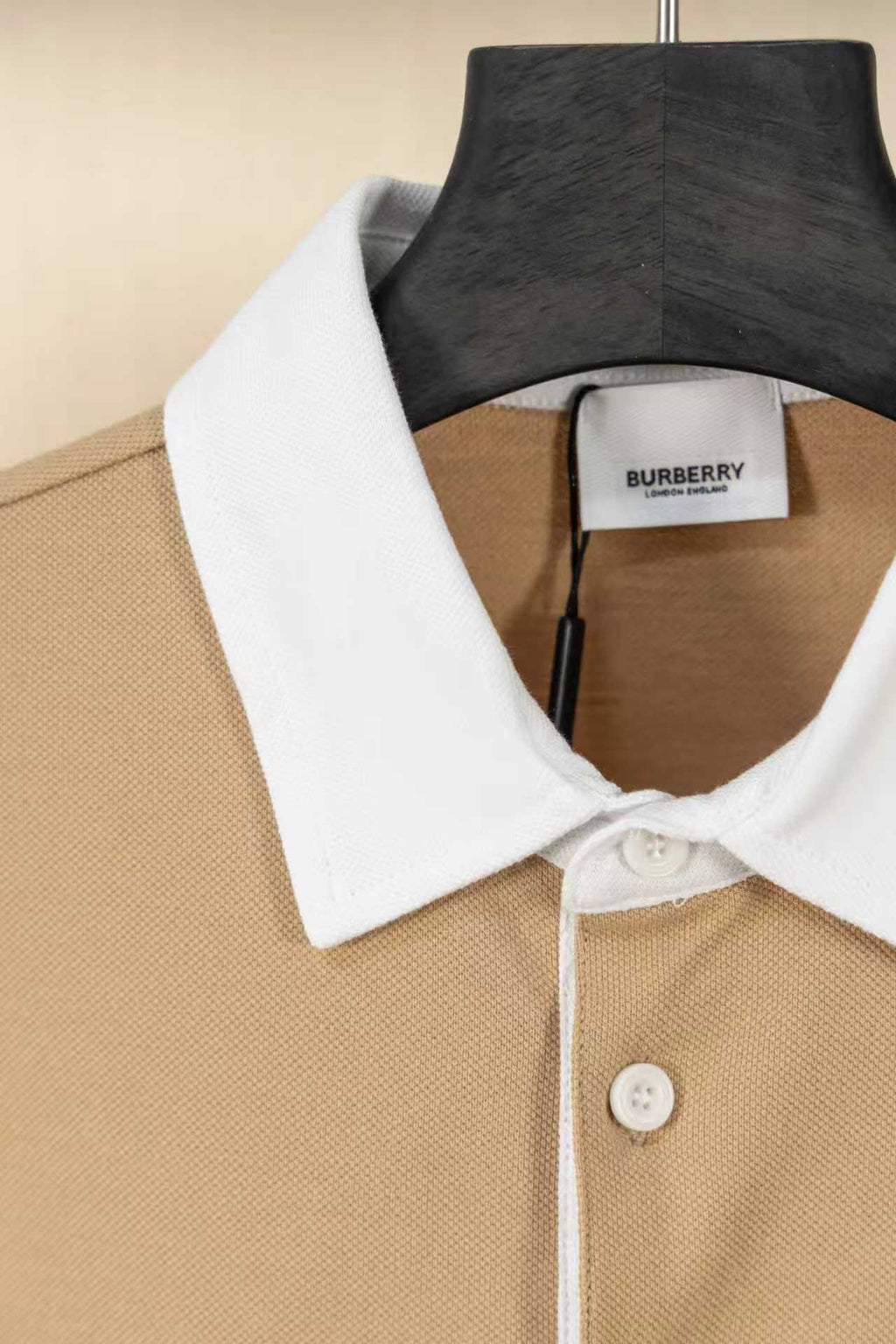 Burberry short-sleeve polo shirt with white contrast collar and button placket