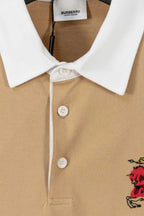 Tan polo shirt front with white collar, three buttons, and horse emblem