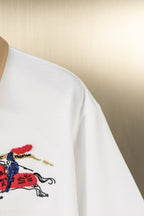 Burberry white polo shirt sleeve with chest embroidery visible
