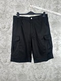 Black cargo pants with front button and utility pockets