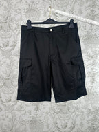 Black cargo pants with front button and utility pockets