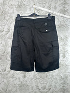 Black cargo pants with side pocket flaps and front button closure