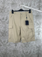 Beige cargo shorts with front button and flap pockets
