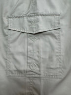 Beige shorts interior with LV emblem patch and decorative stitched motifs
