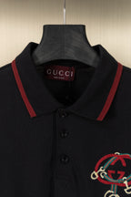 Gucci polo collar with red stripe detail and embroidered chest crest