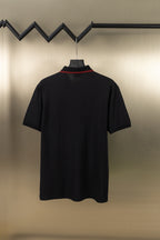 Gucci short-sleeve polo shirt with dark fabric and red-trim collar